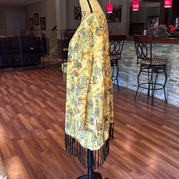 Size 1XL animal print sheer top with tassels along bottom - Picture 3 of 4